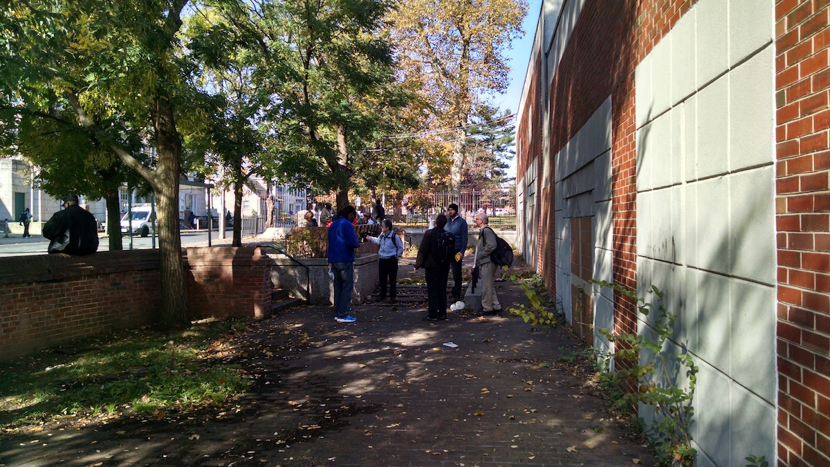 Officials with city and neighborhood groups met up at Chelten Ave. and Greene St. to rethink the plaza there. (Daniel Pasquarello/for NewsWorks) 