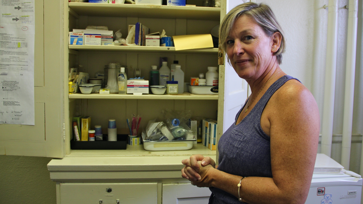  Itinerant nurse Ann Keenan serves the needs of 1,600 children at Nebinger and four other schools. 'Everything can't get done, but we do what we can,' she said. (Emma Lee/WHYY) 