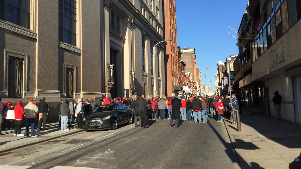 Verizon gather on Race Street between Ninth and 10th in Philadelphia after walking off the job to join a strike of nearly 40