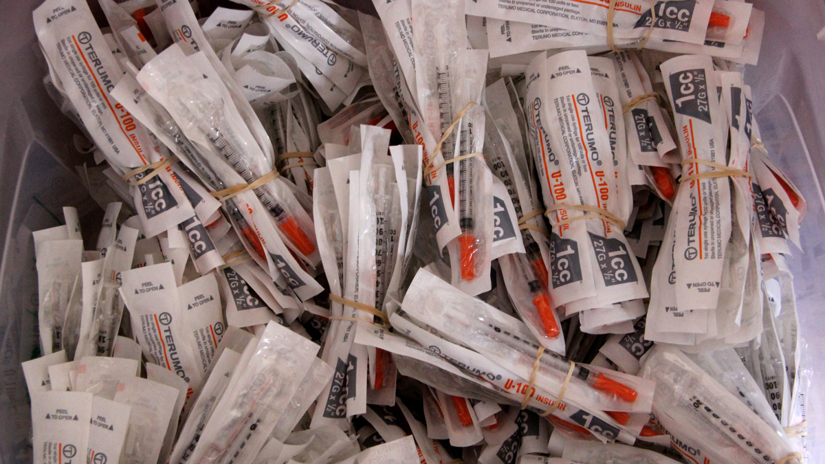 Needles are bundled in tens for Philadelphia's Prevention Point's exchange program. (Emma Lee/WHYY)