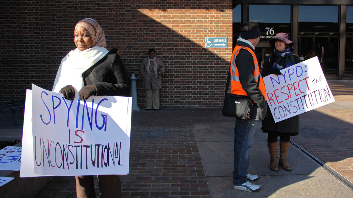  A small group of protesters gathers outside the U.S. Courthouse on Sixth Street during a hearing over New York City police surveillance of  Muslims in New York and New Jersey. (Emma Lee/WHYY) 