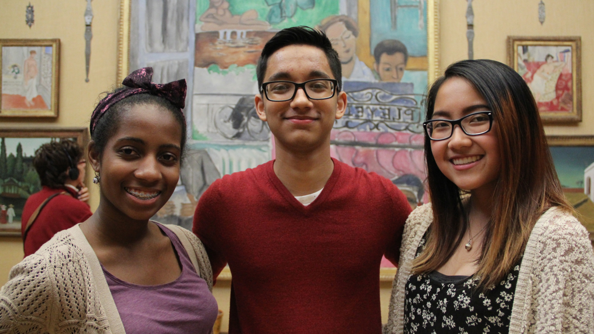  Students who created audio tours (from left) Asia Kaiser, Academy of Natural Sciences; Asef Khurshan, The Barnes; and Sharon Shania, Eastern State Penitentiary, gather at The Barnes for a press event. (Emma Lee/WHYY) 