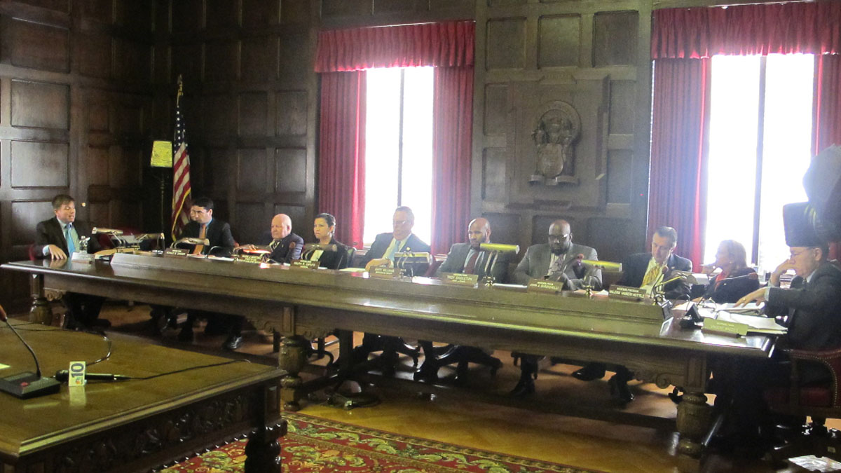  Members of the New Jersey Assembly's Tourism and Gaming Committee discuss casino construction outside Atlantic City Thursday. (Phil Gregory/WHYY) 