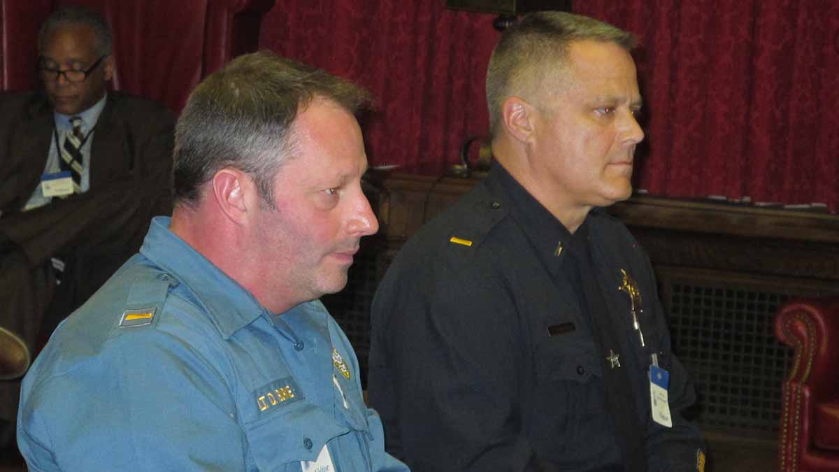  Union County Sheriff’s Lt. Dennis Burke, left, and Mercer County Sheriff’s Lt. Harry Harbourt tell the Assembly Homeland Security Committee the swatting calls are happening across New Jersey. (Phil Gregory/WHYY) 