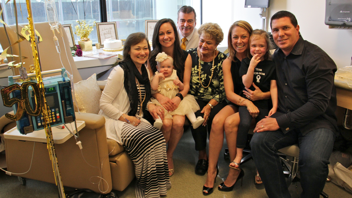 Chemotherapy is a family affair for lung cancer patient Debbie Hemmes (left). Family members (from left) daughter Karen Hemmes