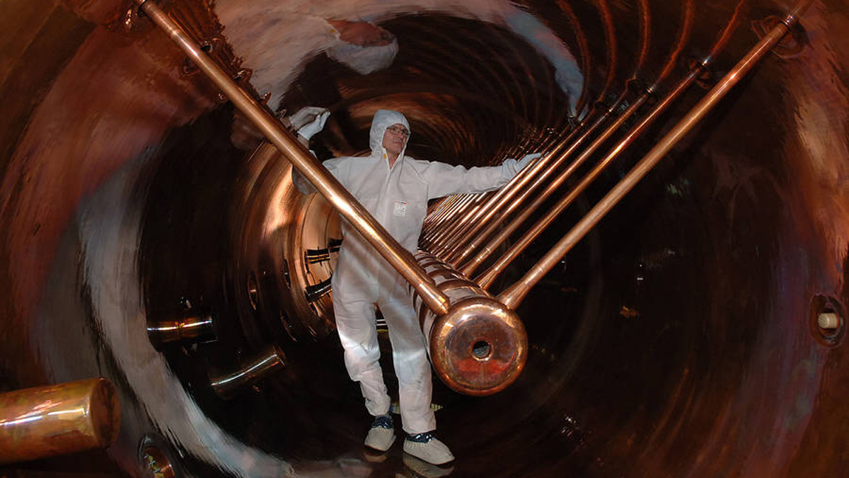 A view into the 120-meter long linear accelerator at GSI Helmholtz Center for Heavy Ion Research in Germany