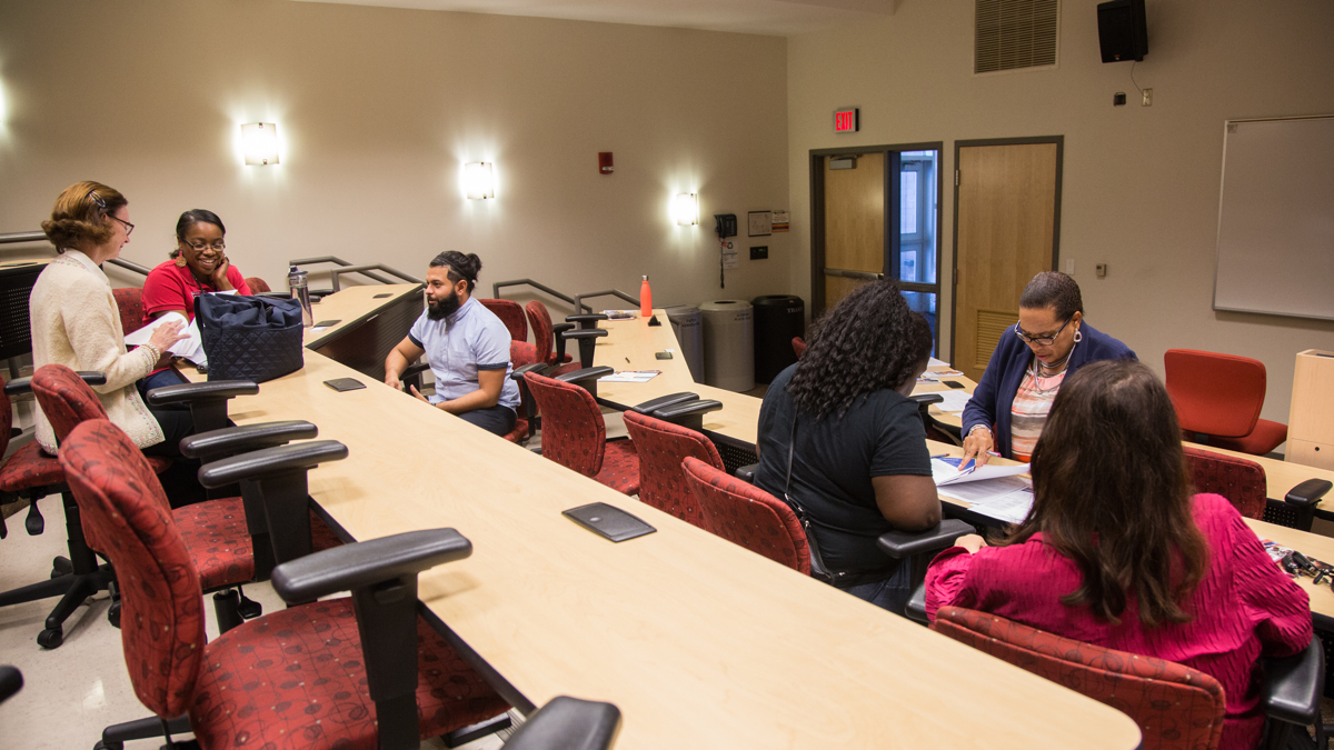 Former students of the now closed ITT Technical Insitute meet with teachers and advisers Thursday to learn more about their options for continuing their education at Montgomery County Community College. (Emily Cohen for NewsWorks)