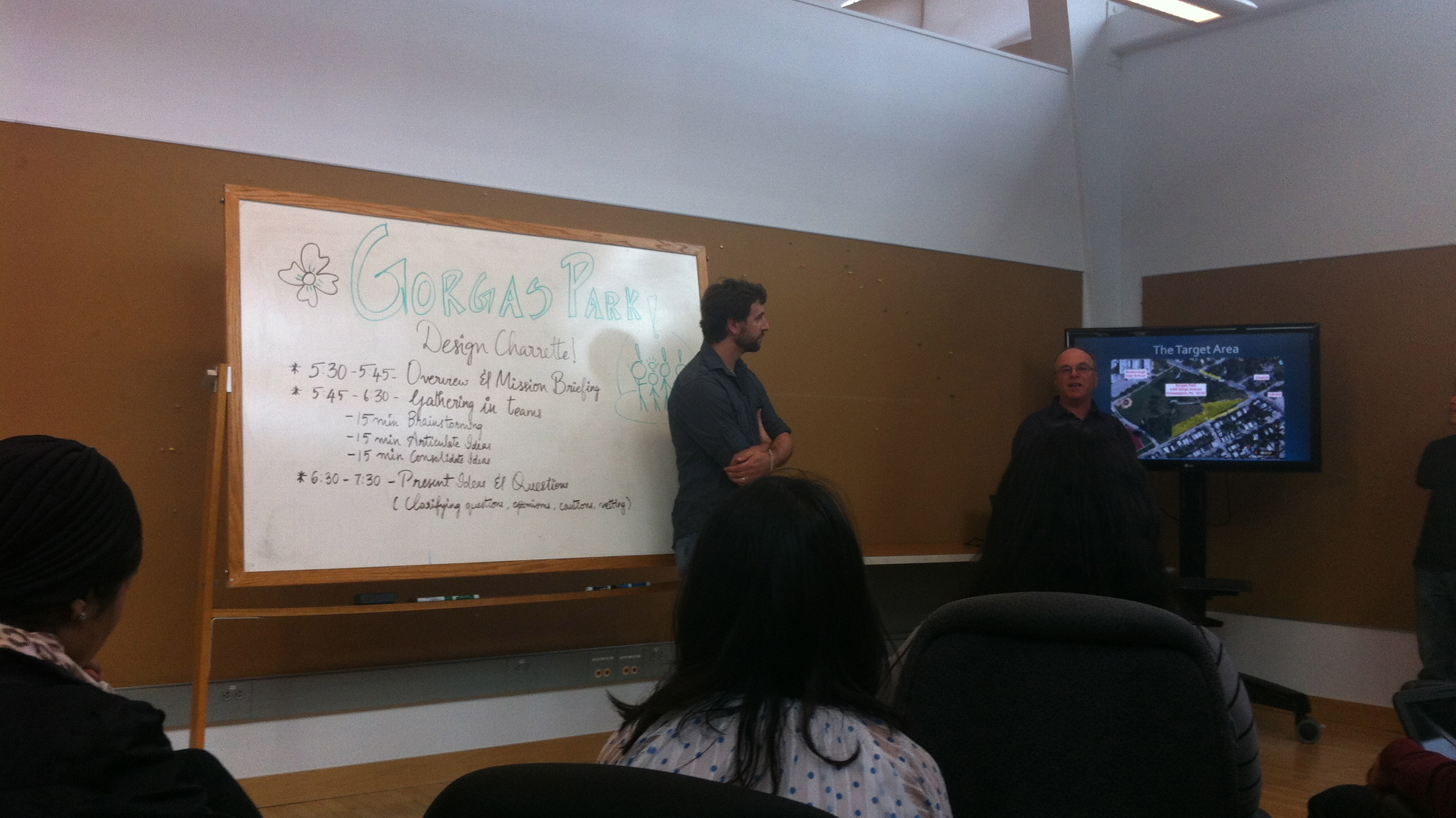  Sustainable design graduate student Joseph Tursi and the Friends of Gorgas Park director, John Boyce, leading the charrette on Tuesday evening. (Emily Brooks/for NewsWorks) 
