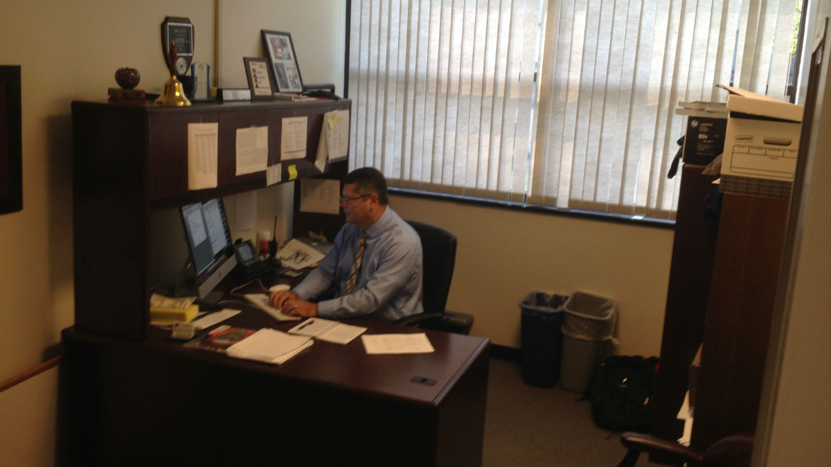  Former teacher of the year John Sell works in his office at Sussex Tech. (Avi Wolfman-Arent, NewsWorks) 