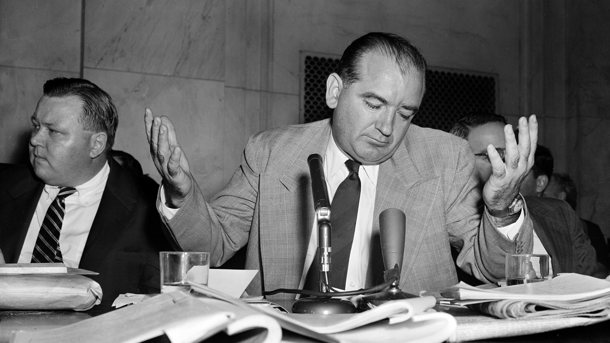  Sen. Joseph McCarthy, R-Wis., is shown giving a resigned shrug during a 1954 Senate Investigation Subcommittee hearing in Washington, D.C. (AP Photo/WF) 