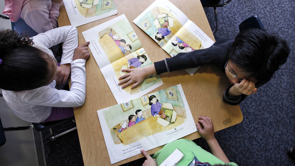  Kindergarten students work on reading skills. Pennsylvania law doesn't require schools to offer kindergarten, and allows those that do to impose enrollment deadlines. (AP file Photo/Elaine Thompson) 
