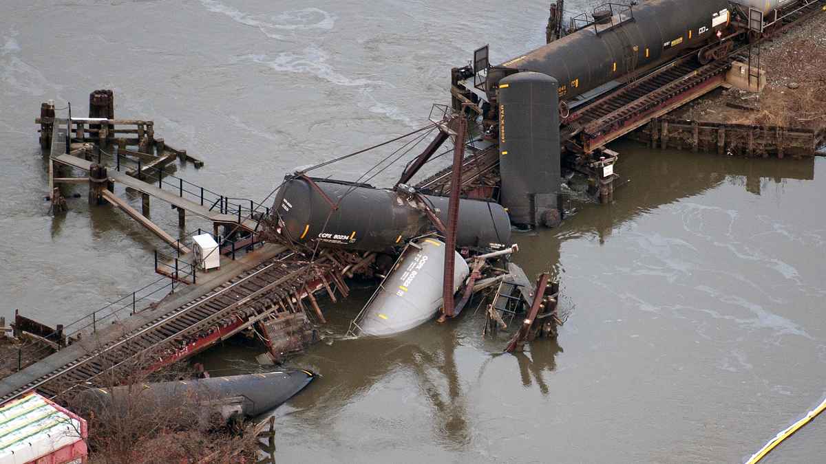  Derailed freight train cars lay in water in Paulsboro, N.J., Friday, Nov. 30, 2012. (AP Photo/Cliff Owen) 