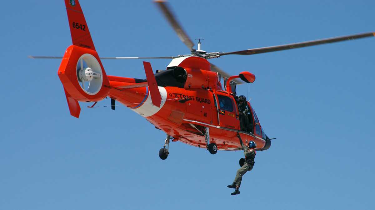 The boaters were rescued by the Coast Guard using a MH-65 Dolphin helicopter