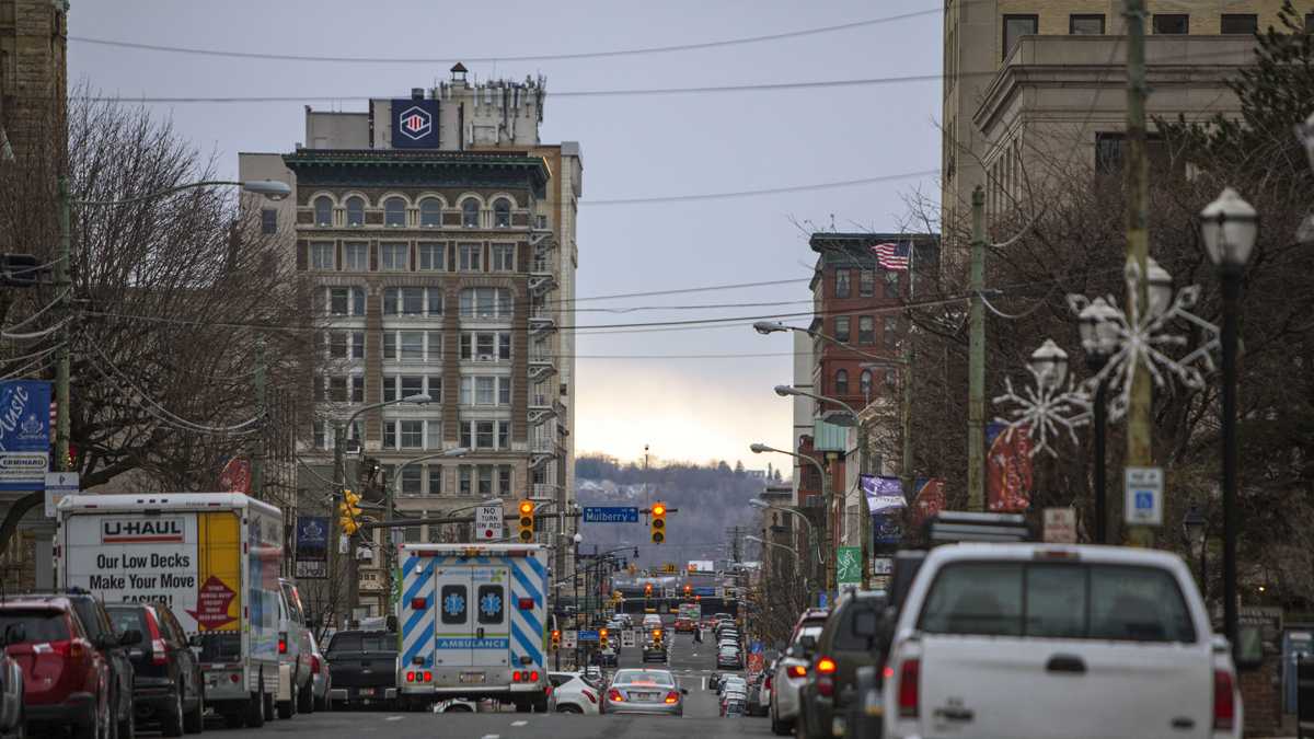 An ambulance drives in downtown Scranton.