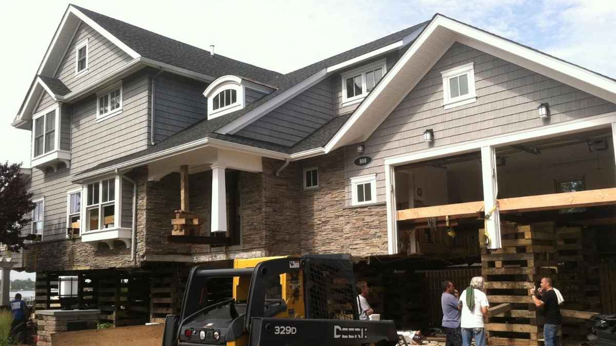  The home has been lifted roughly 8 feet above its foundation. (Tracey Samuelson/WHYY) 
