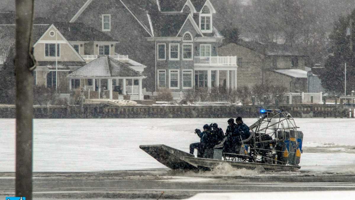 Marine crews search the frozen Toms River on March 1