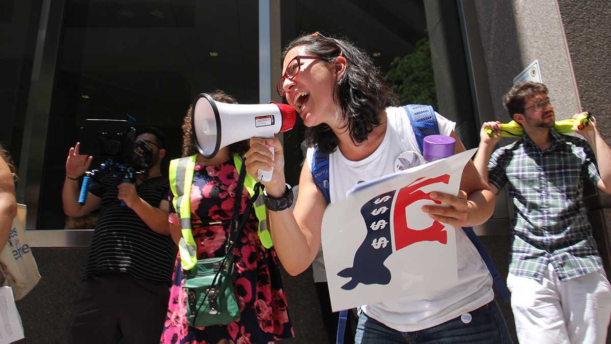  Xelba Gutierrez leads a protest demanding that the Democratic National Convention reveal its sources of funding on Thursday, July 21, 2016 in Philadelphia, Pa. (Emma Lee/WHYY) 
