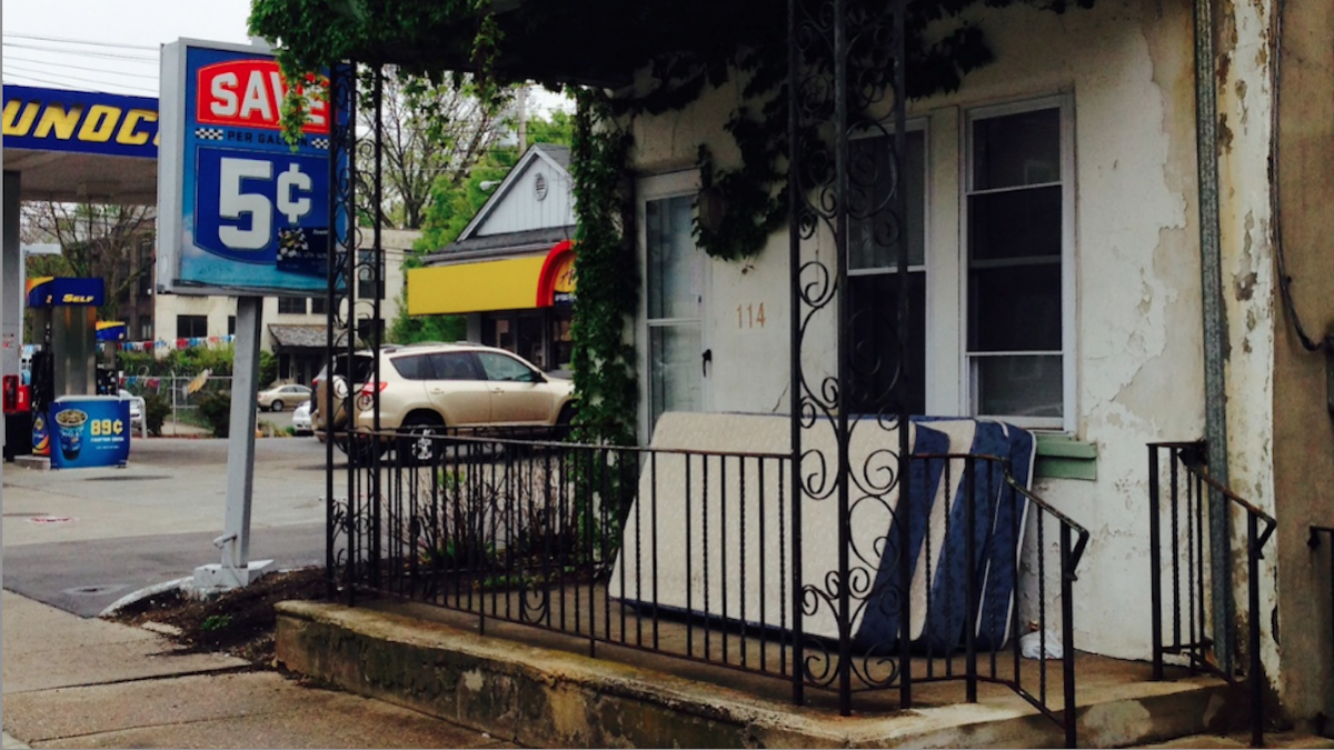  The home where Douglas Ferrin lost part of his right hand in an explosion last week is located next to a gas station. (Brian Hickey/WHYY) 