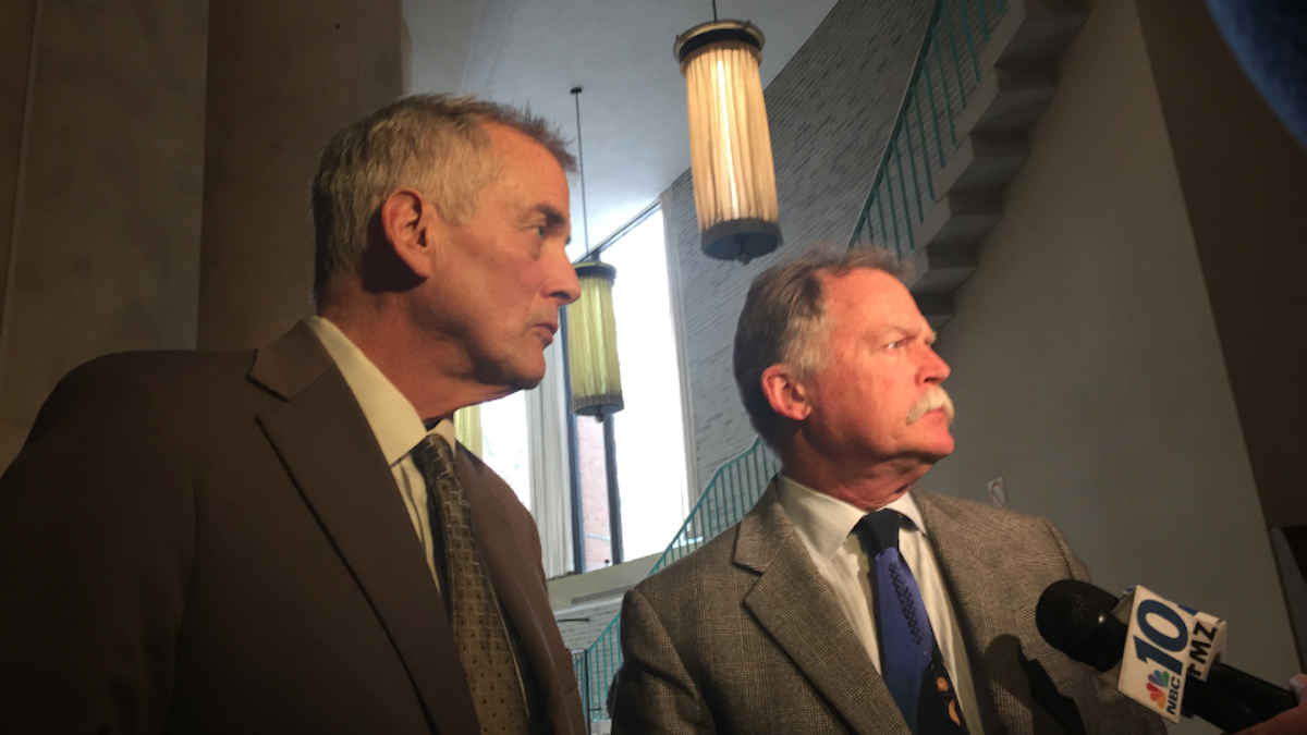  Don Tollefson (left) did not walk out of the Bucks County courthouse after being sentenced to state prison on Wednesday. On the first day of the trial, he fielded questions with court-appointed attorney Robert Goldman. (Brian Hickey/WHYY)  