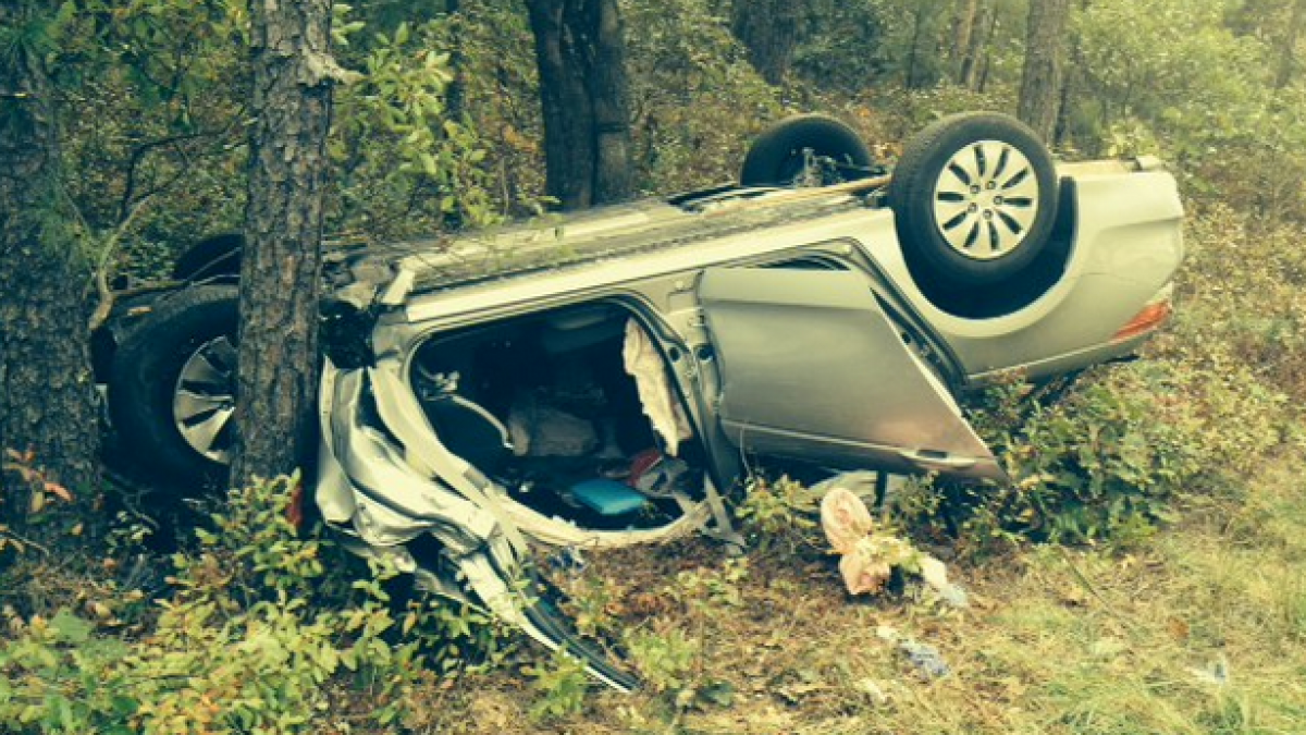  An overturned car from an Oct. 2014 crash on Route 539 in Manchester. (Photo courtesy of the Manchester Police Department) 