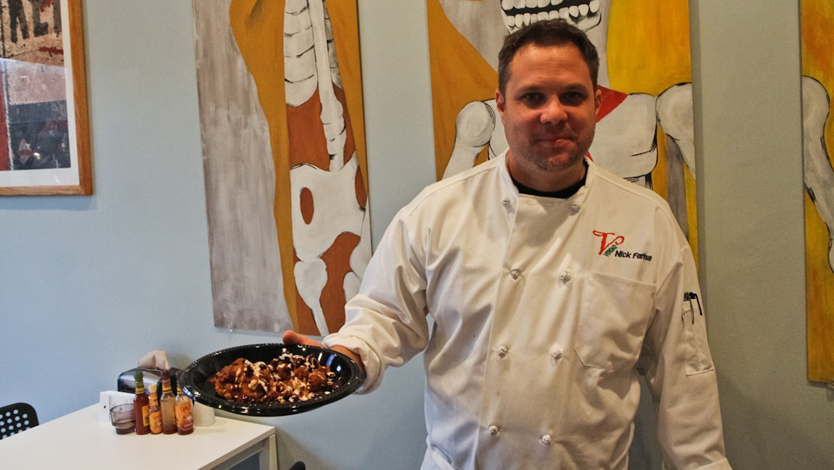  Nick Farina, owner of Union Taco at Seventh and Girard, will enter his sweet potato, apple chutney latke in the Latkepalooza at the Gershwin-Y Monday. (Kimberly Paynter/WHYY) 