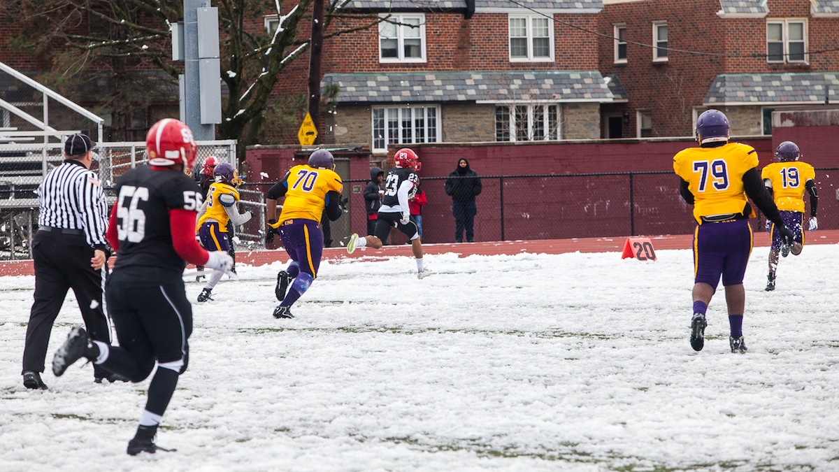 DJ Moore runs for another Imhotep touchdown during this year's Thanksiving Day Legacy Bowl. (Brad Larrison/for NewsWorks)