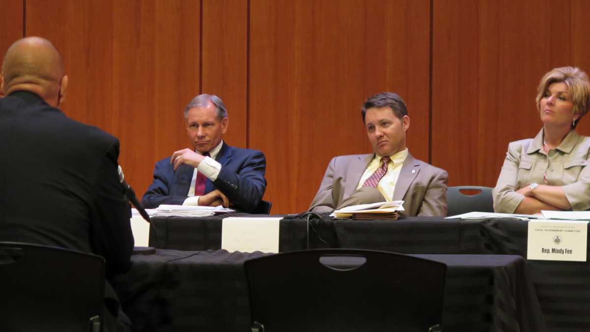  State Senate Local Government Committee Chairman John Eichelberger, R-Blair/Cumberland, and Minority Chairman Rob Teplitz, D-Dauphin, with Rep. Mindy Fee, R-Lancaster, at a meeting in 2014. Eichelberger, Teplitz and state Sen.'s John Blake, D-Lackawanna, and Mike Folmer, R-Lebanon, are sponsoring five bills aimed at better regulating local public debt. (Emily Previti/WITF) 