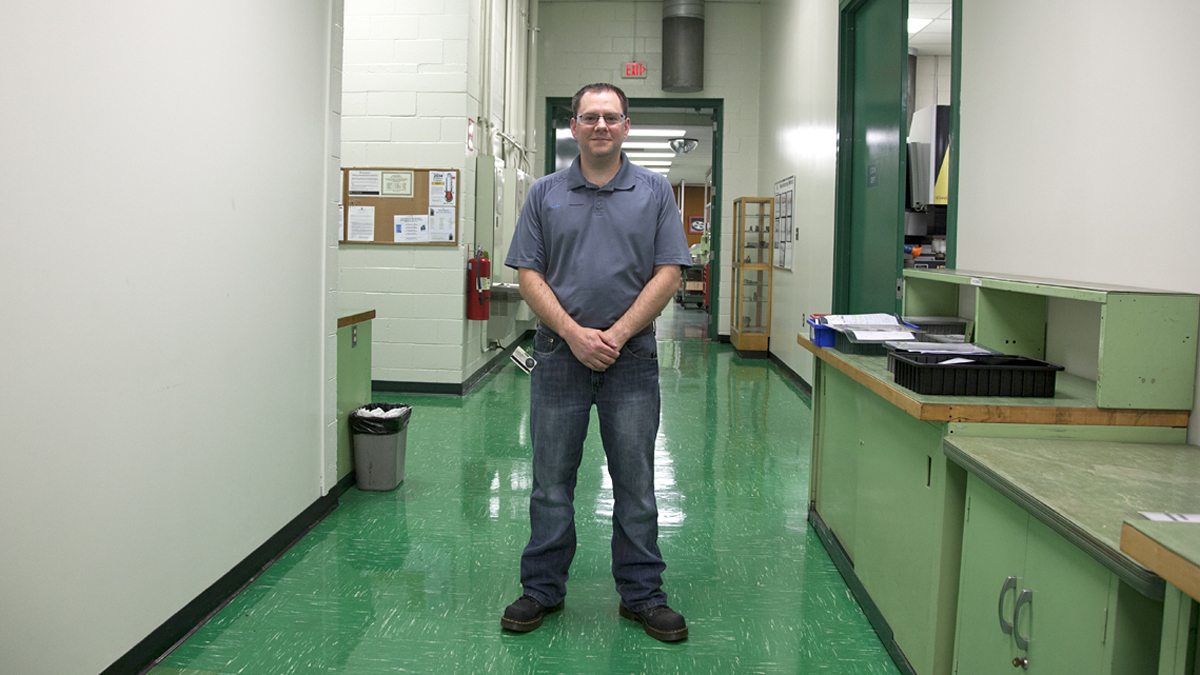  Chris Boltz, a manufacturing engineer with Oberg Industries, has been there since 1998. When he decided to attend Oberg's apprentice program instead of attending college, his high school counselor told him he was throwing away his life. (Irina Zhorov/WESA)  