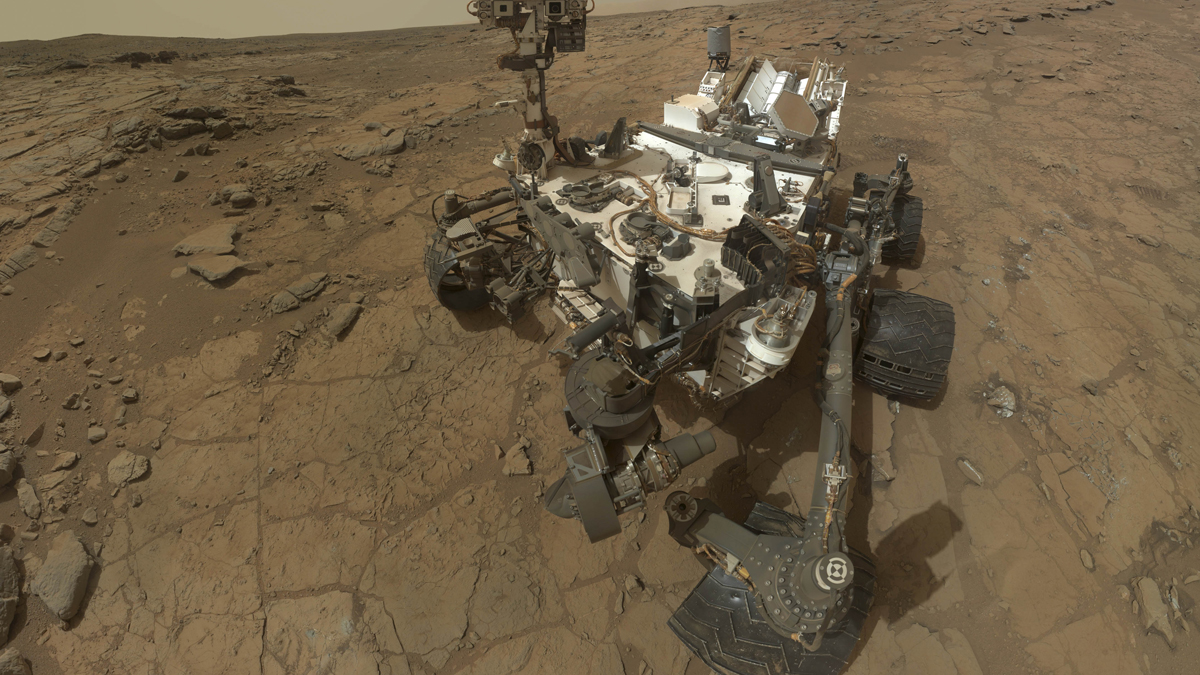 Evidence of an ancient freshwater lake has been discovered on Mars. Researchers say the evidence supports the idea that the lake might have been hospitable to life. (AP Photo/NASA)