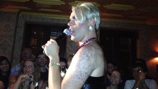  Martha Graham Cracker, who is sometimes called Dito van Reigersberg, in song and walking through the audience at her 8th Anniversary Show, Thursday at L'Etage. (Howard Shapiro/for NewsWorks) 