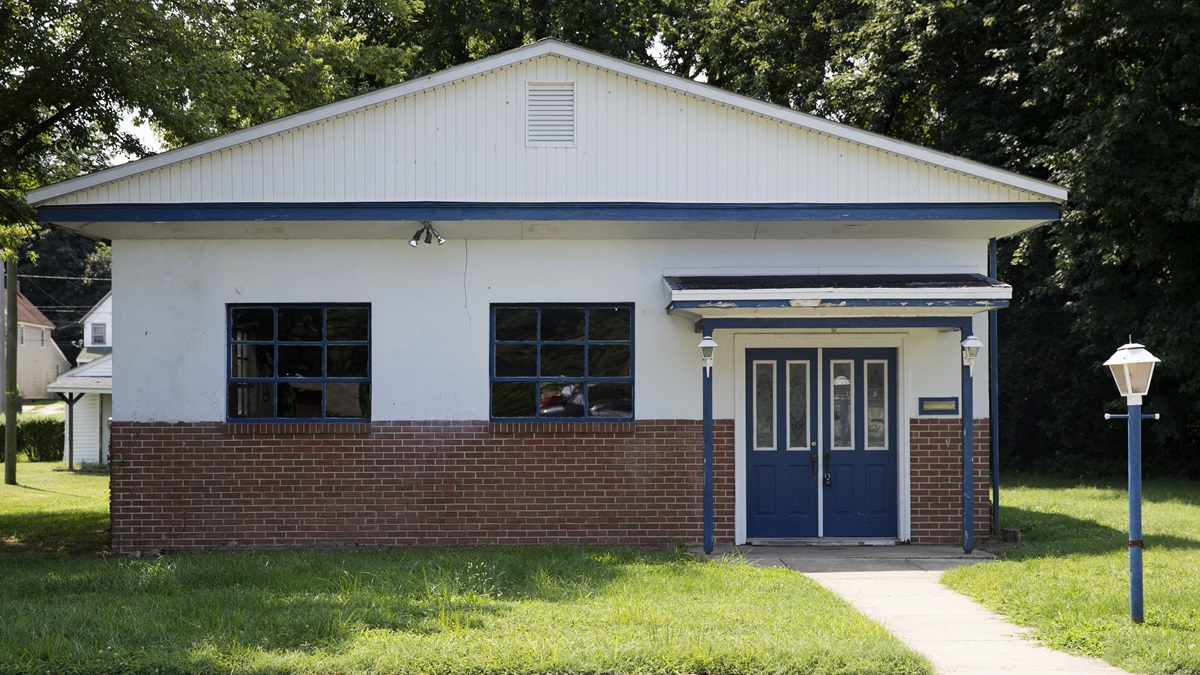  This file photo shows the site of the former Minus Funeral Home in Dover, Del. State officials have released the names of more than two dozen people whose cremated remains were recently discovered inside the abandoned funeral home in Dover after unsuccessful efforts to locate surviving relatives. (AP Photo/Evan Vucci, File) 