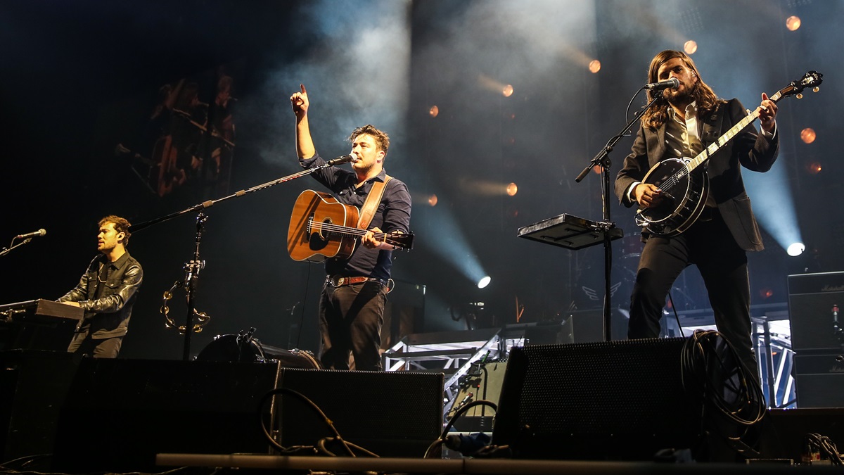  Ben Lovett, from left, Marcus Mumford and Winston Marshall of Mumford & Sons perform at The Forum on Monday, Aug. 17, 2015, in Inglewood, Calif. (Photo by Rich Fury/Invision/AP) 
