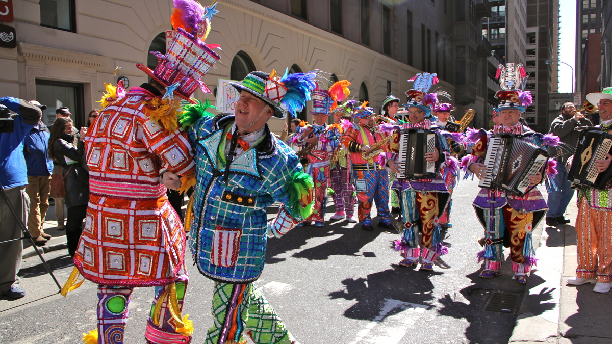 The Mummers are back to ring in the year 2017.  Pictured: Mummers Shawn Slivinski and Mike Doyle dance as the Joseph A. Ferko String Band plays outside 1518 Walnut St.