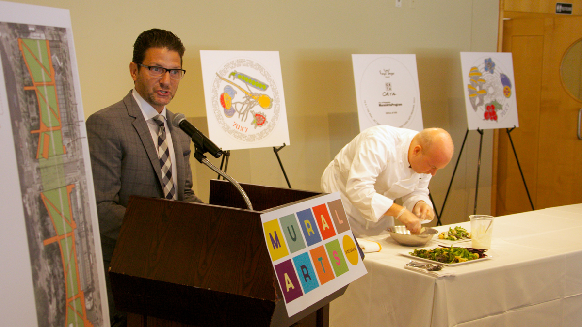  Joe Volpe, whose Cescaphe Event Group is providing the catering for the Mural Arts event on Independence Mall, speaks at a press conference Wednesday. (Nathaniel Hamilton/for NewsWorks) 