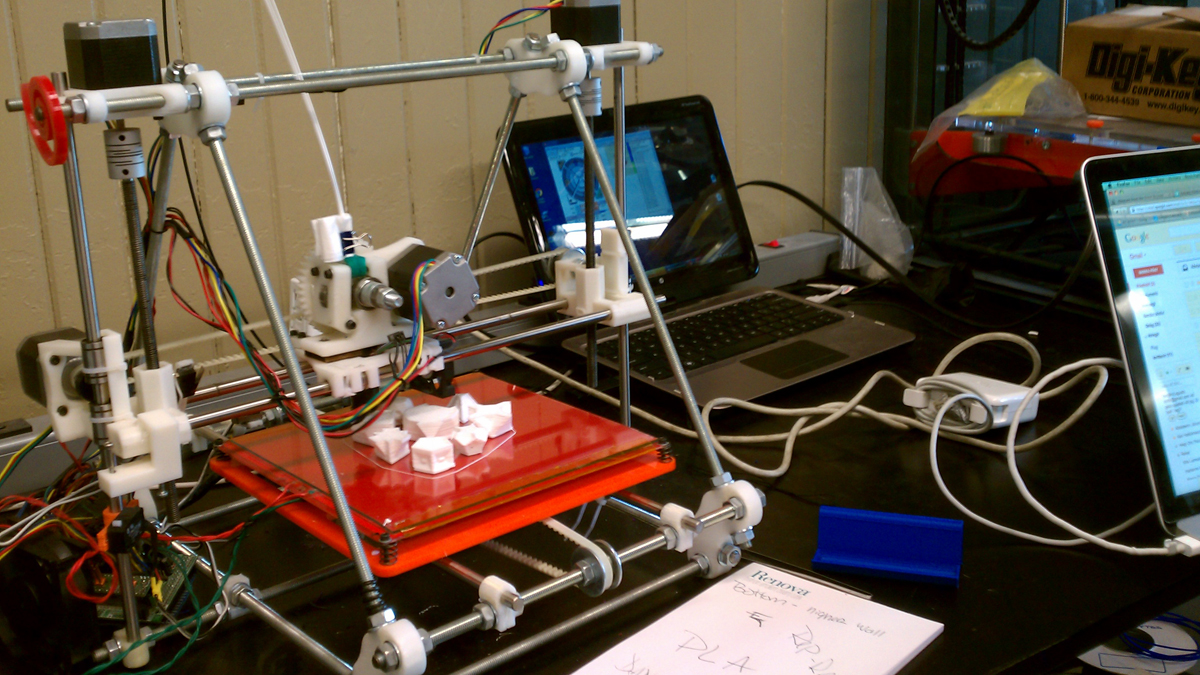  Kolbeinn Hugi, a visiting artist from Reykjavik, Iceland, is using a 3-D printer to make crystal shapes for the 'Due North' exhibit. (Peter Crimmins/WHYY) 