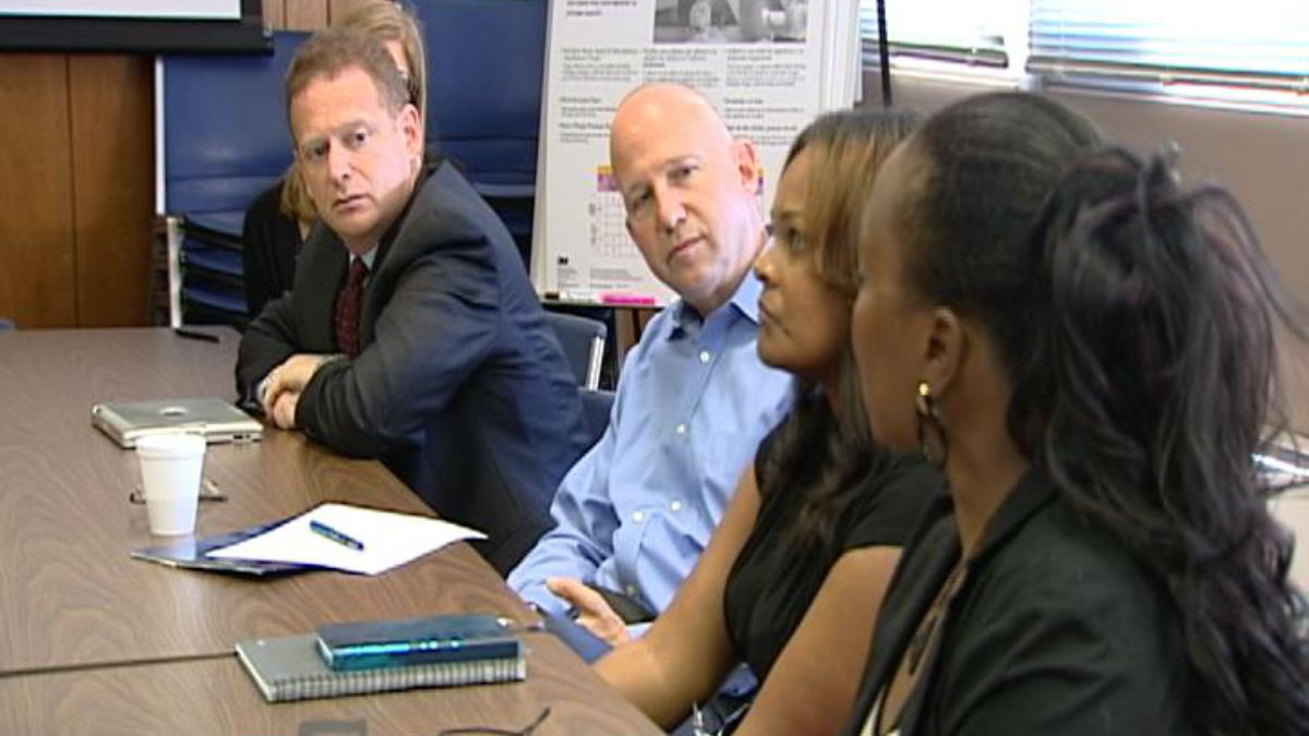  Lt. Gov Matt Denn and Gov. Jack Markell listen as nurses in the NFP program talk about their work. (Charlie O'Neill/WHYY) 
