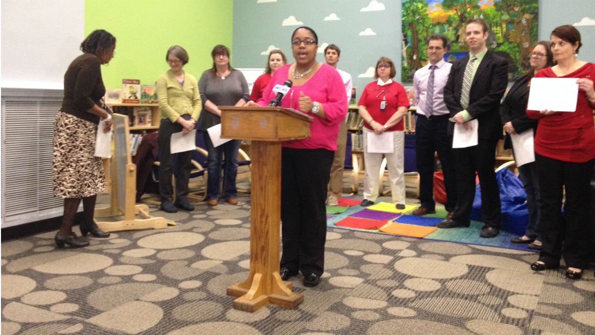  Warner Elementary School teacher Equetta Jones (center) speaks to the media. (Avi Wolfman-Arent, WHYY) 