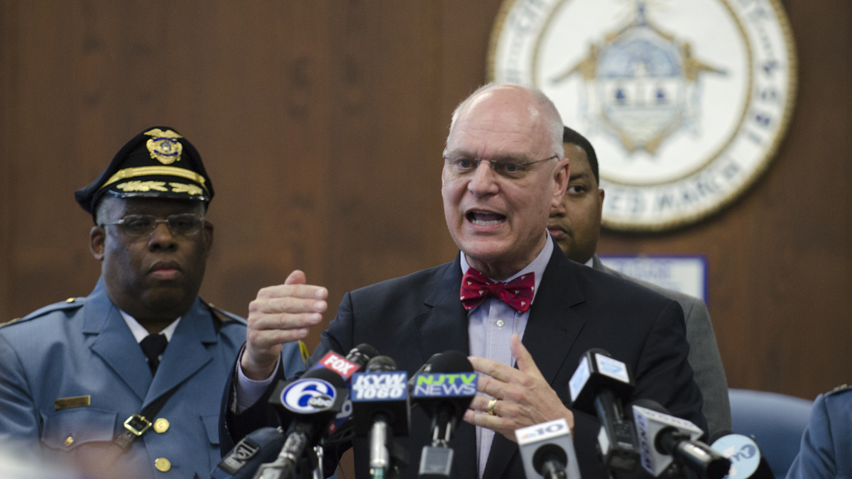Atlantic City Police Chief Henry White looks on as Atlantic City Mayor Don Guardian talks about the city shutdown during a press conference held at Atlantic City
