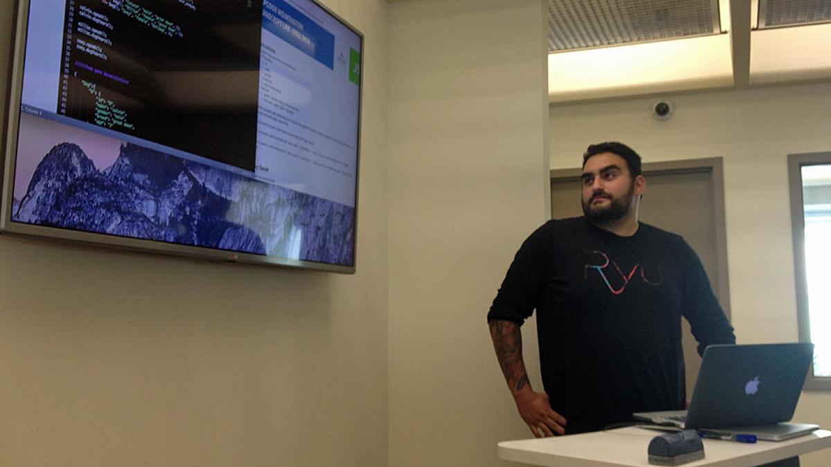  Zip Code Wilmington student Sean Strauss presents a project to his classmates. (Avi Wolfman-Arent/WHYY) 