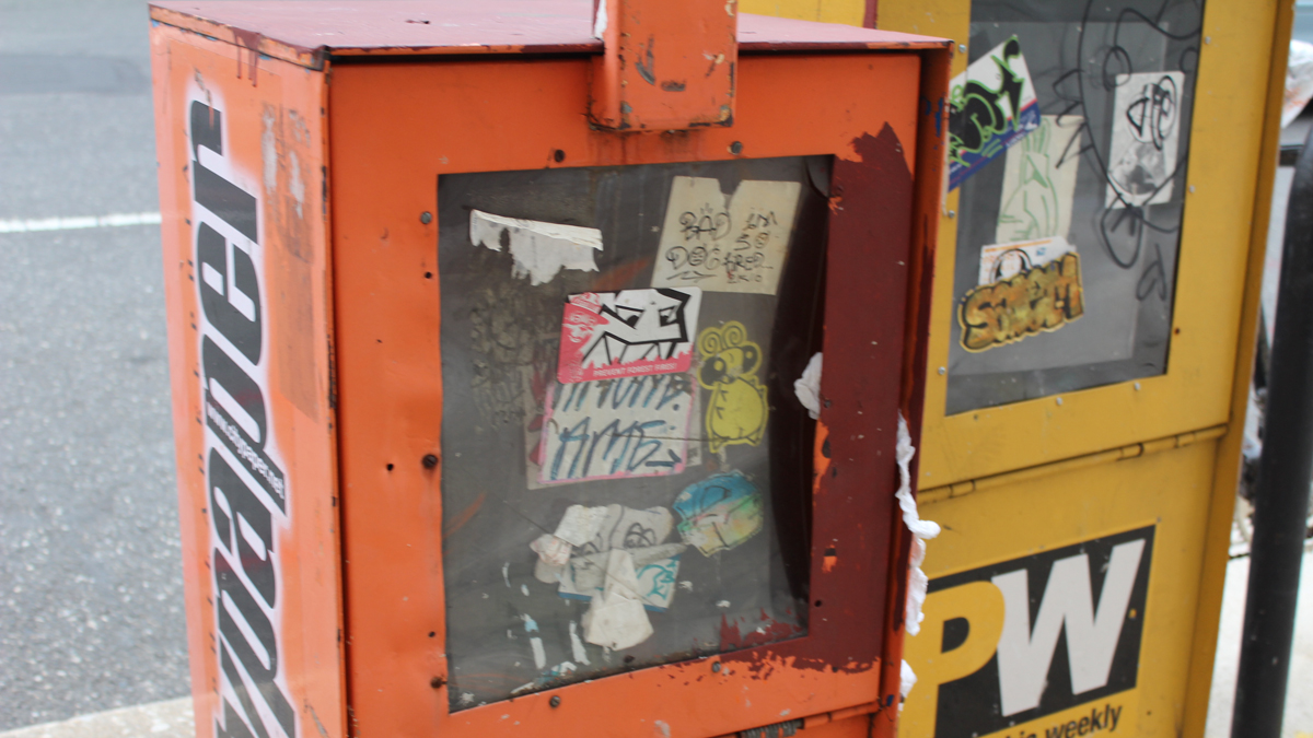  Newspaper boxes for Philadelphia's free alt-weeklies, the City Paper and Philadelphia Weekly, stand side by side (Elisabeth Perez-Luna/WHYY) 