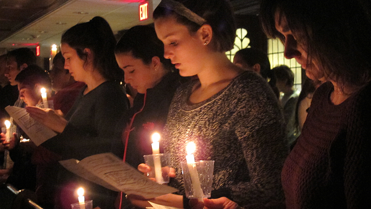  About 100 people gathered for a candlelight vigil at Emmanuel Evangelical Lutheran Church in Souderton, Pa. to mourn the victims of a Montgomery County shooting rampage earlier this week. Hours earlier, police discovered the body of the alleged shooter, Bradley Stone who apparently took his own life.(Katie Colaneri/WHYY) 
