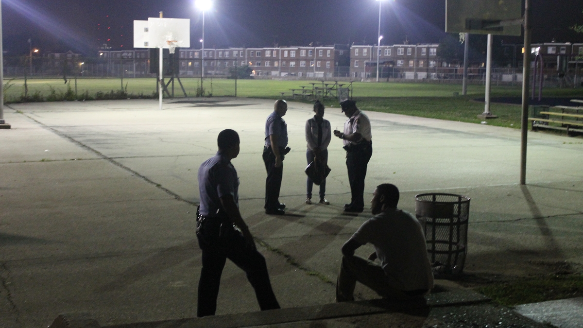  A call for a 'person screaming' results in a tense moment for the officers of the Northwest Task Force. (Matt Grady/WHYY) 