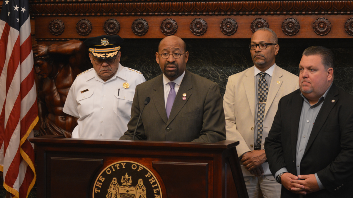  Philadelphia Police Commissioner Charles Ramsey (from left). Mayor Michael Nutter, Deputy Mayor Everett Gillison and John McNesby, head of the police union. (Tom MacDonald/WHYY) 