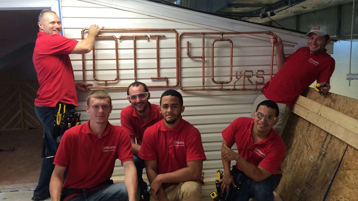  Orleans Technical Institute's electrical trade students celebrate the school's 40th anniversary [Image courtesy of Orleans Technical Institute] 