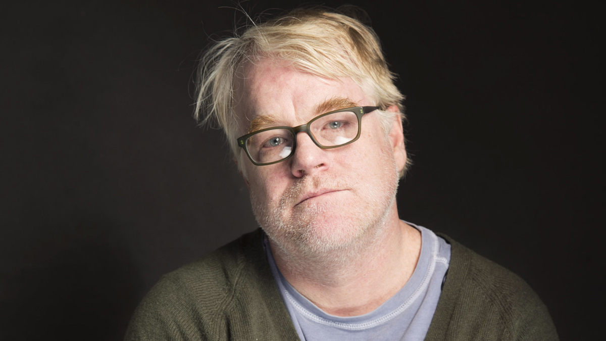  In this Jan. 19, 2014 photo, Philip Seymour Hoffman is shown sitting for a portrait during the Sundance Film Festival, in Park City, Utah. Hoffman was found dead Sunday, Feb. 2, 2014, in his New York apartment. He was 46. (Photo by Victoria Will/Invision/AP) 