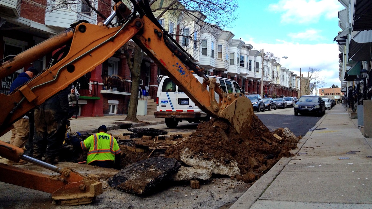  PWD has been working to repair a water main break on the unit block of West Sharpnack Street. (Jana Shea/for NewsWorks) 