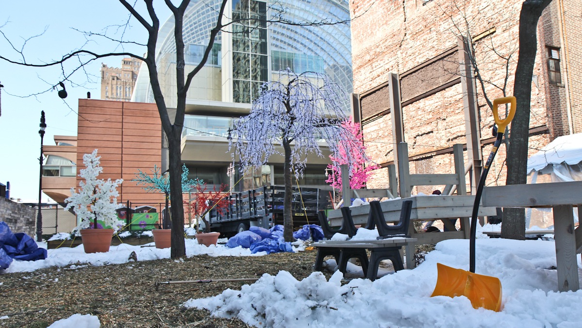 PHS staffers are working to clear the Pop-Up Beer Garden for tonight's Valentine's Day event. (Kimberly Paynter/WHYY)