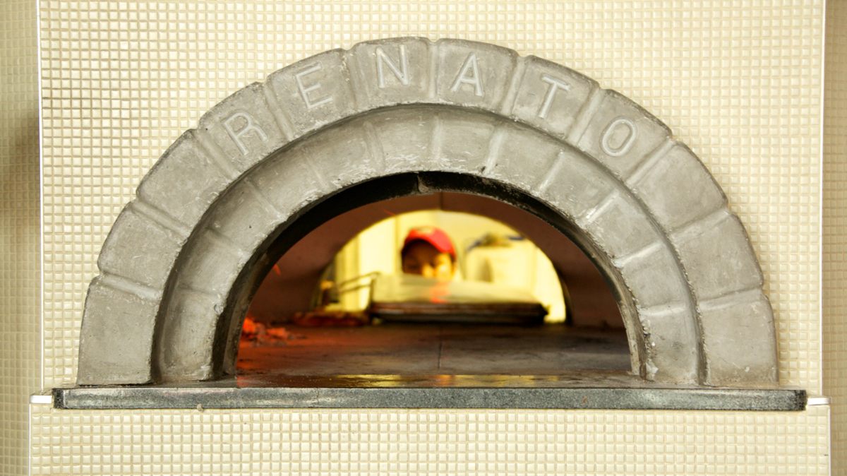  Pizzeria Vetri hybrid oven has duel openings allowing for better circulation of air and use of the oven by the chefs. (Nathaniel Hamilton/for NewsWorks) 