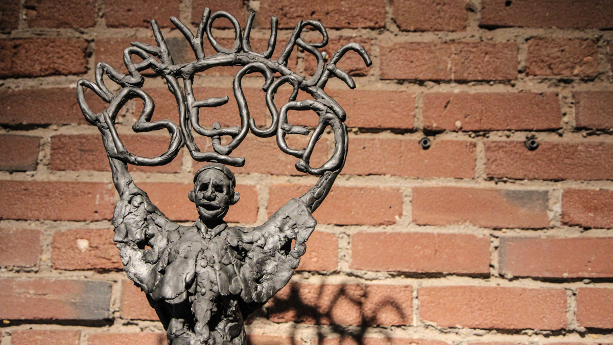 ‘May you be blessed’, a patinated resin sculpture by Erica Volpe. (Kimberly Paynter/WHYY) 