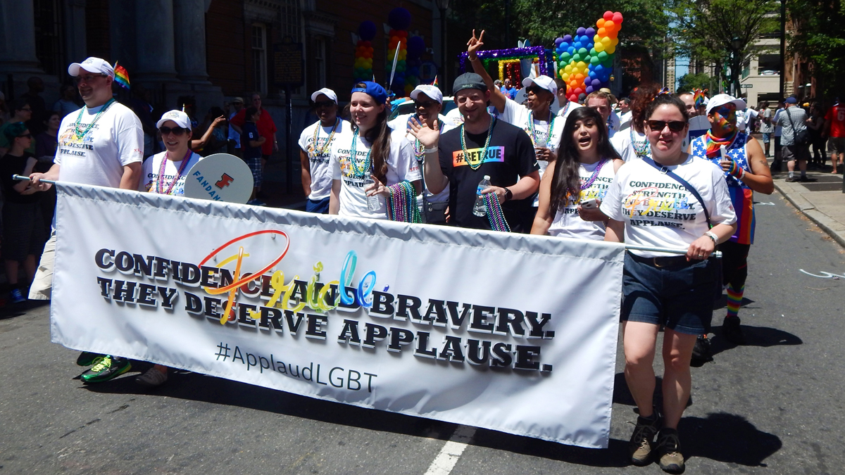 A contingent from Comcast marches in the 2016 Philly pride parade. (Bill Chenevert for NewsWorks)